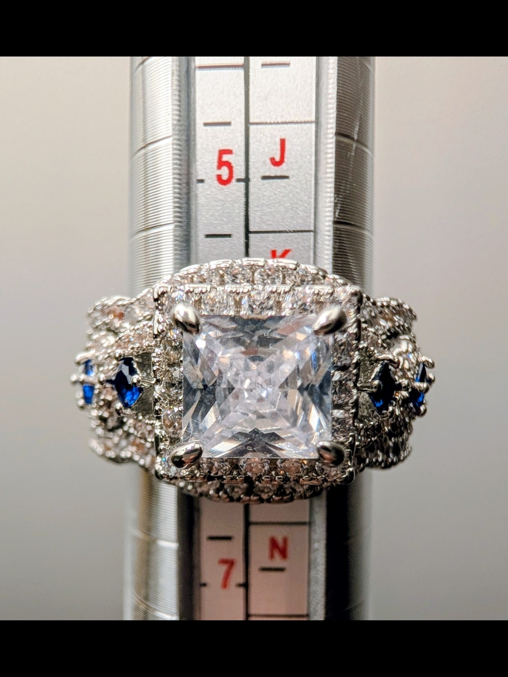 CZ And Silver Halo Ring with Blue CZ Accent Stones - Size 6